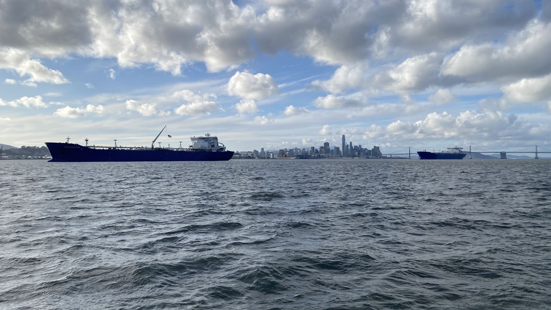 Vessel crossing San Francisco Bay near the Bay Bridge