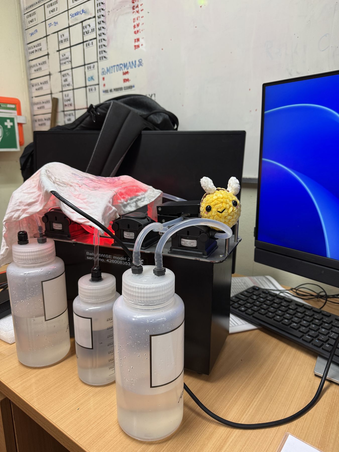 Ballast water sample bottles collected for analysis