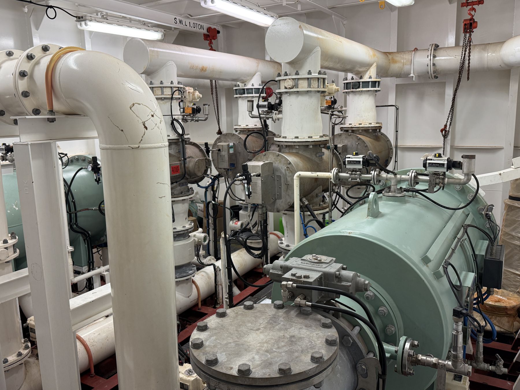 Engine-room ballast water piping during an on-site survey